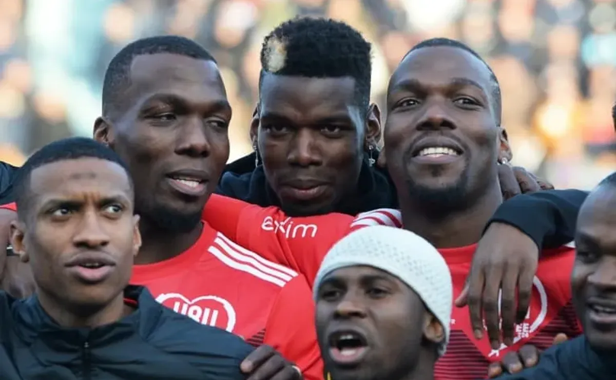 France's Paul Pogba, his mother Yeo and his brothers celebrate