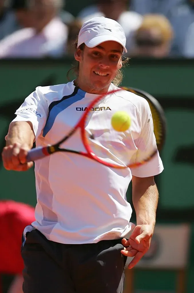 El golpe emblemático del Gato, su exquisito revés a una mano. (Foto: Getty).