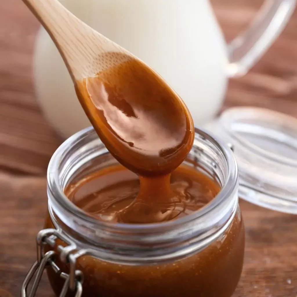 Ciertas personas prefieren las sopaipillas con manjar para un toque dulce