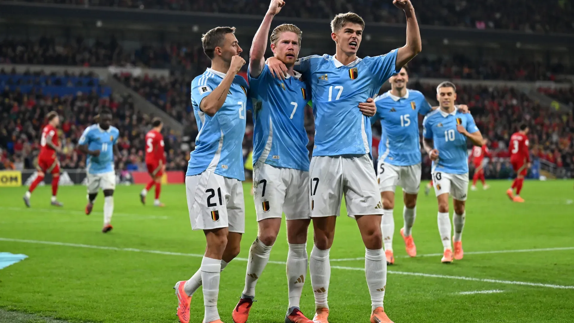 Kevin De Bruyne of Belgium celebrates with teammates after scoring his team’s third goal. Dan Mullan/Getty Images