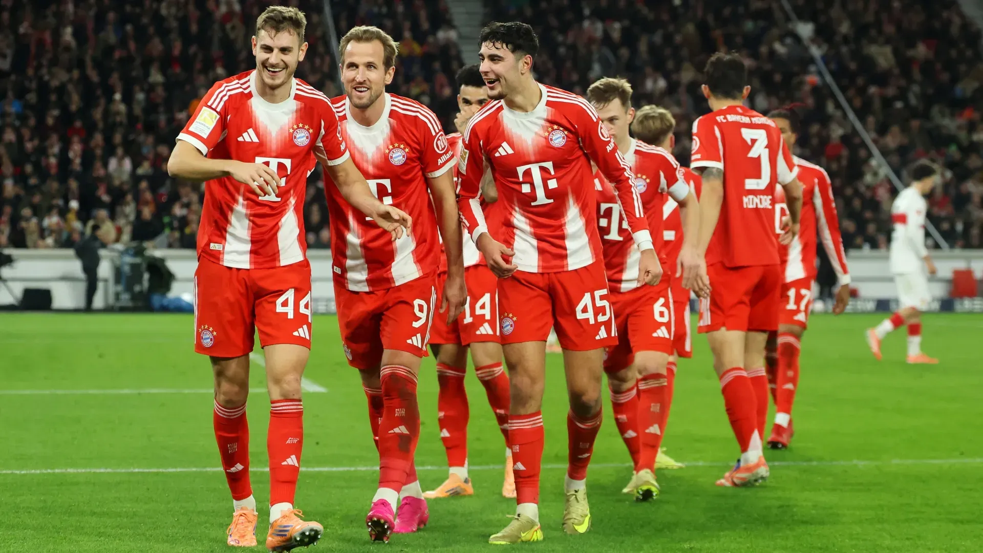 Josip Stanisic of FC Bayern Munich celebrates scoring his team’s third goal with teammates. Alex Grimm/Getty Images