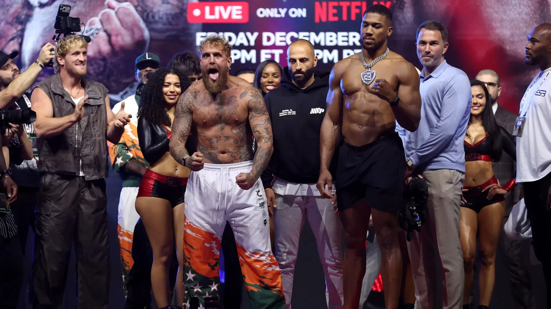 Jake Paul faces off against Anthony Joshua during the weigh-in. Megan Briggs/Getty Images for Netflix