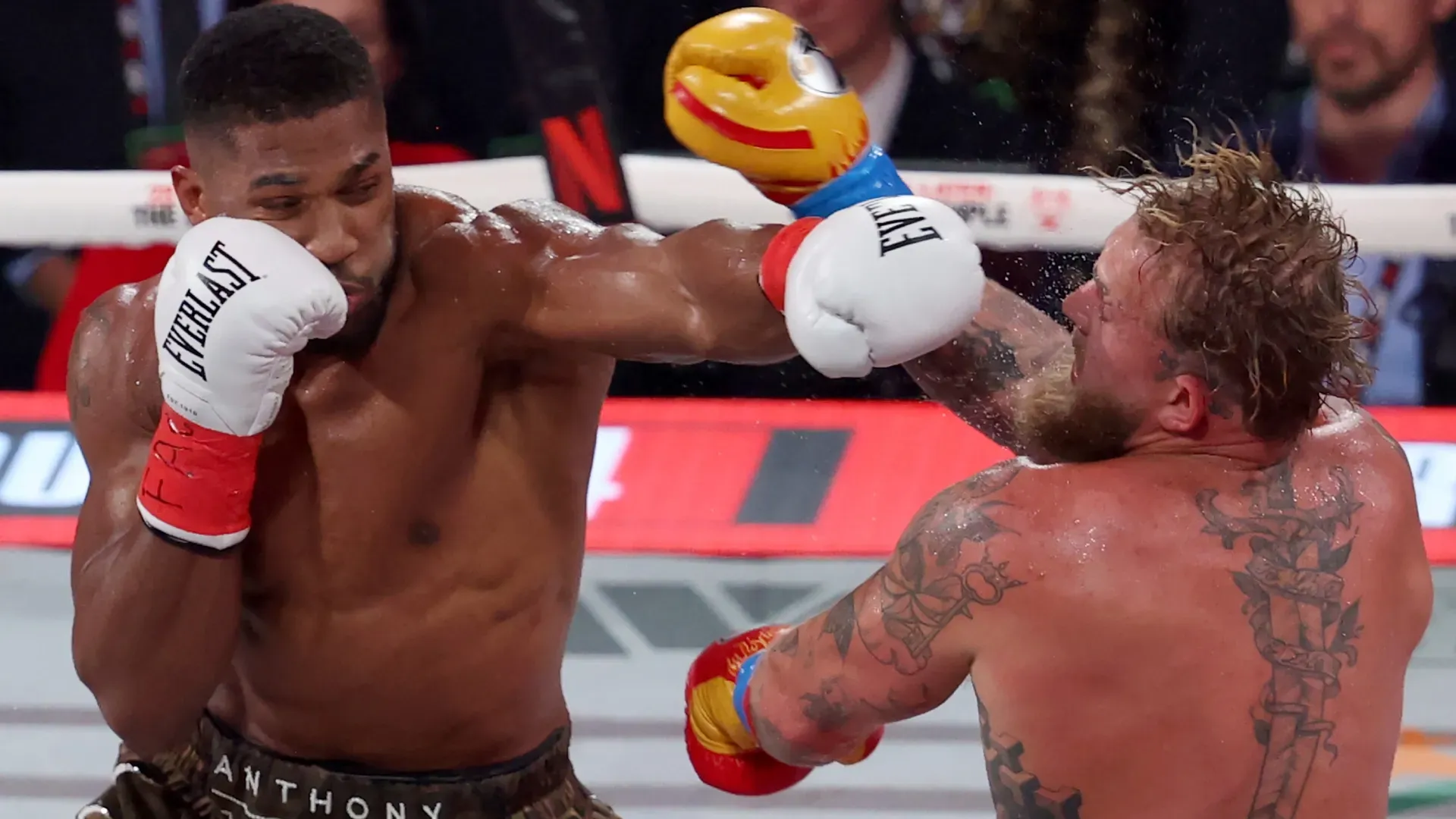 Anthony Joshua punches Jake Paul in their heavyweight bout. Leonardo Fernandez/Getty Images