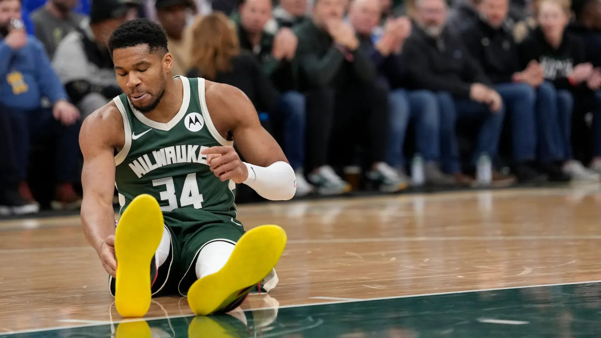 Giannis Antetokounmpo after getting injured against the Pistons. (Getty Images)