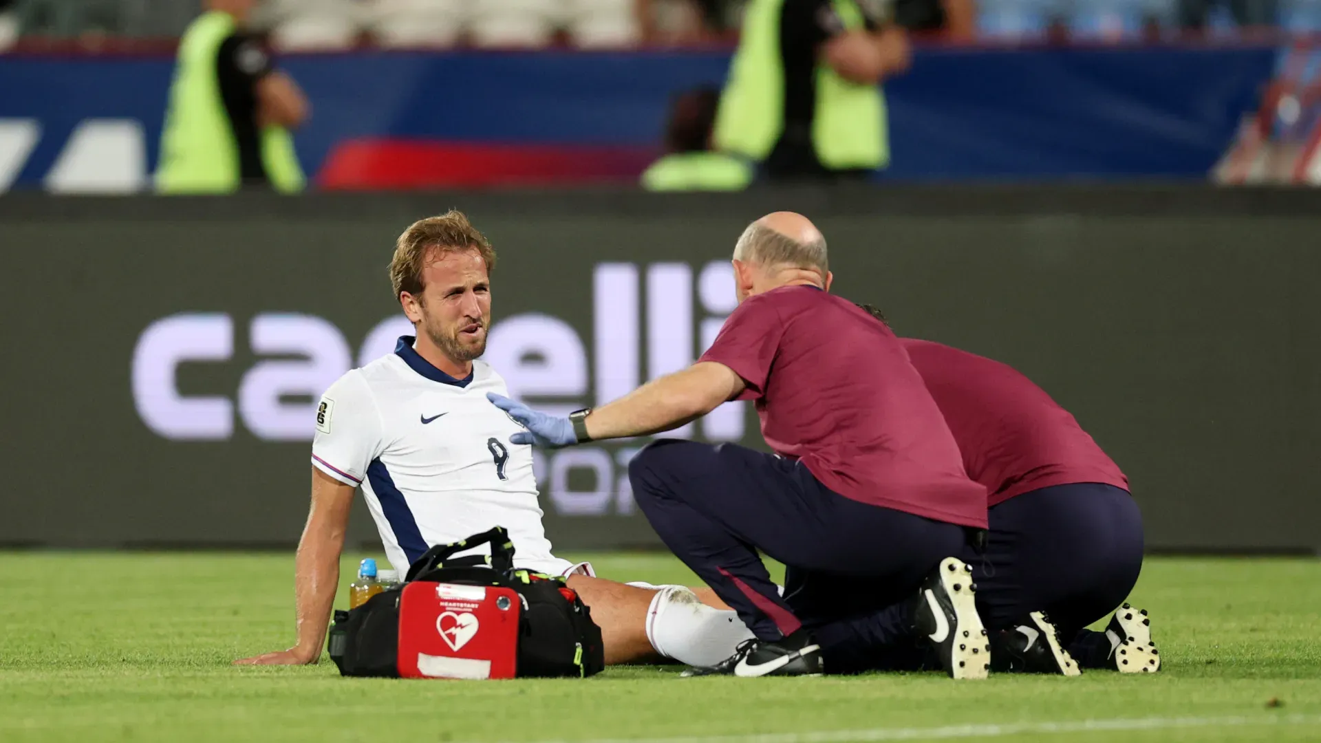 Harry Kane being assisted by medical staff. (Getty Images)