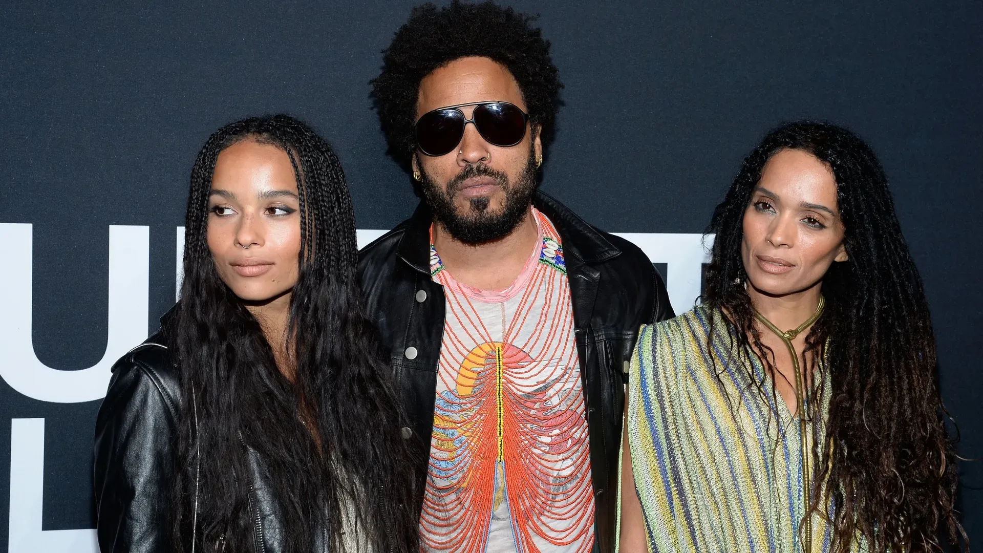 Musician Lenny Kravitz (center) and actresses Zoe Kravitz (L) and Lisa Bonet R) attend the Saint Laurent show at The Hollywood Palladium on February 10, 2016 in Los Angeles, California. (Photo by Kevork Djansezian/Getty Images)