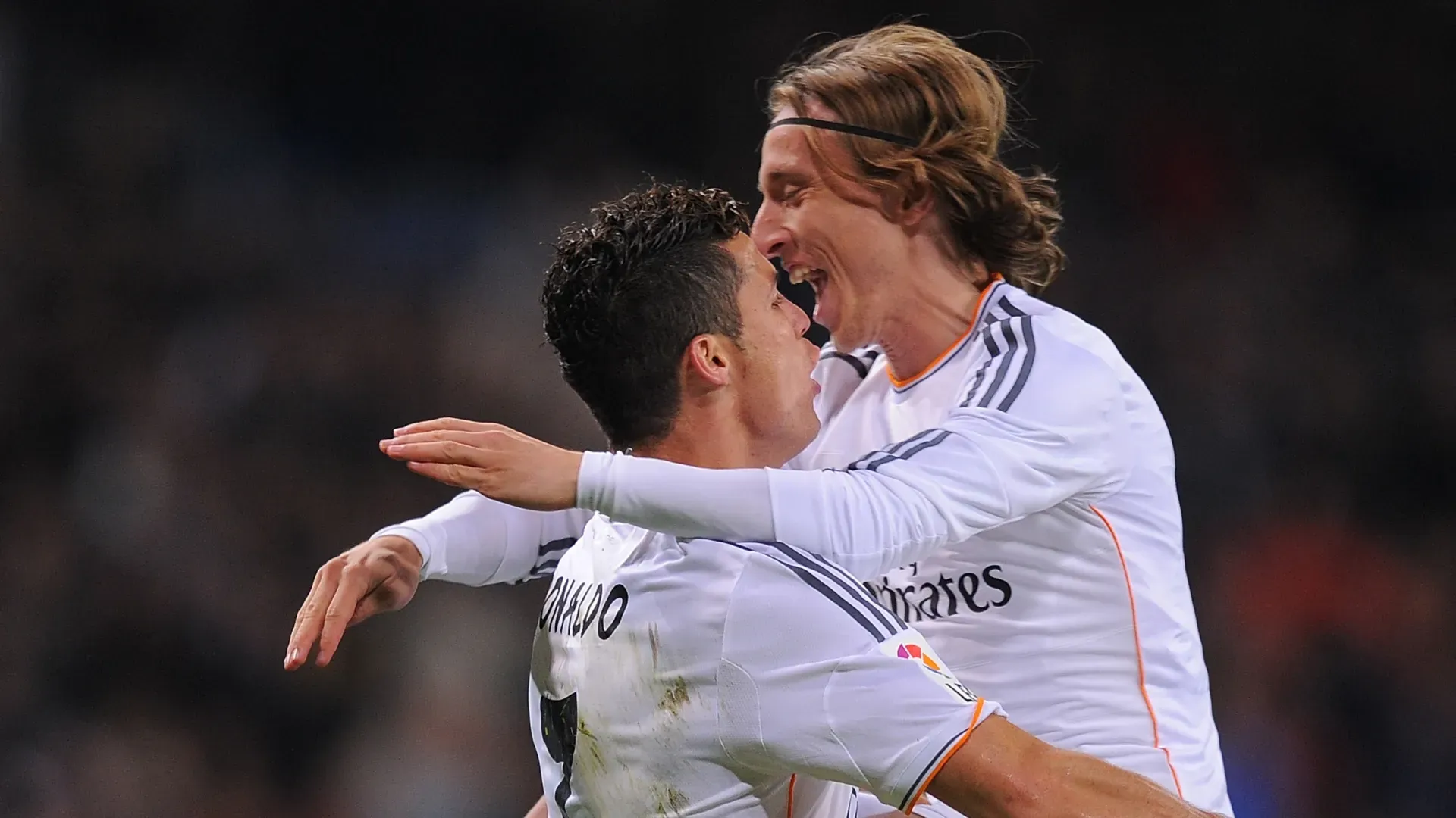 Cristiano Ronaldo and Luka Modric playing for Real Madrid.