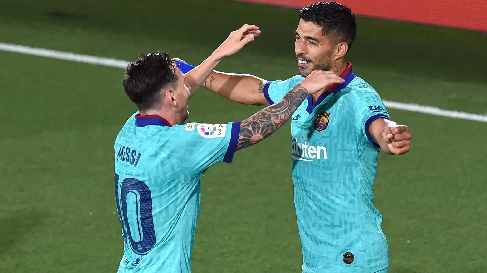 Lionel Messi y Luis Suárez, en la etapa que fueron compañeros en el Barcelona. Getty Images.