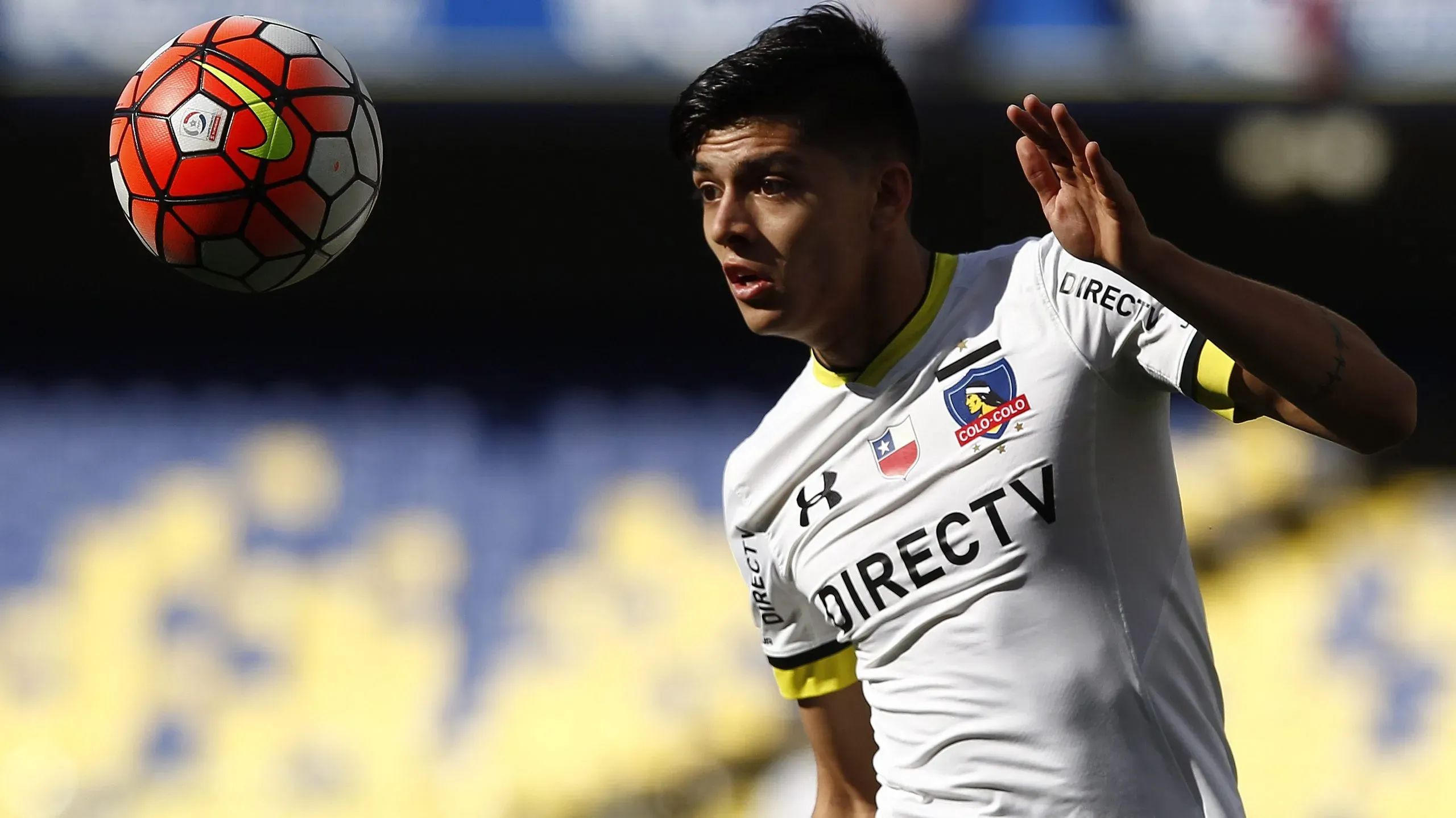 Cristián Gutiérrez jugando por Colo Colo vs. U. de Conce. (Photosport)