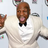 Mike Tyson poses with soccer kit while filming movie