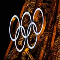 Why is the Paris 2024 Olympic Opening Ceremony not held in a stadium?