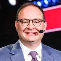 Why is legendary NBA insider Adrian Wojnarowski retiring from ESPN?