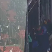 No solo pasa en Colo Colo: Captan a hinchas de U de Chile pasándose por la reja en duelo de Copa Libertadores
