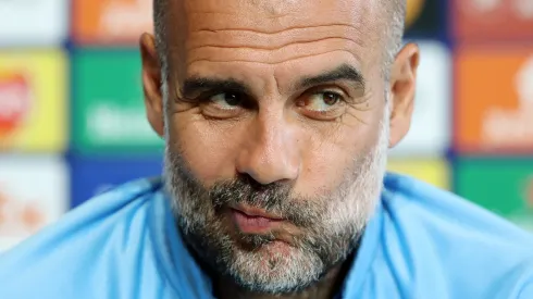 Pep Guardiola, Manager of Manchester City speaks during a press conference ahead of their UEFA Champions League group G match against Borussia Dortmund at Etihad Stadium on September 13, 2022 in Manchester, England. (Photo by Charlotte Tattersall/Getty Images)
