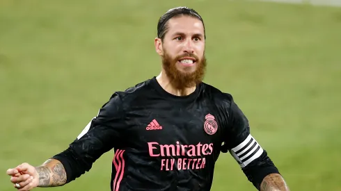 Sergio Ramos of Real Madrid celebrates after scoring his team's third goal from the penalty spot during the La Liga Santander match between Real Betis and Real Madrid at Estadio Benito Villamarin on September 26, 2020 in Seville, Spain. Sporting stadiums in Spain remain under strict restrictions due to the Coronavirus Pandemic as Government social distancing laws prohibit fans inside venues resulting in games being played behind closed doors. 
