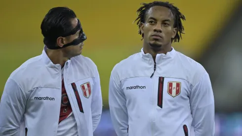 Gianluca Lapadula and André Carrillo of Peru line up prior to a match between Brazil and Peru as part of South American Qualifiers for Qatar 2022 at Arena Pernambuco on September 09, 2021 in Recife, Brazil. 
