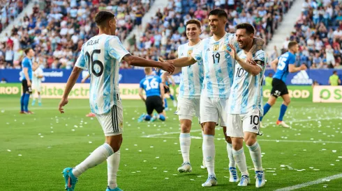 PAMPLONA, SPAIN – JUNE 05: Lionel Messi of Argentina  celebrates with his teammates Carlos Joaquin Correa of Argentina after scoring his team's third goal during the international friendly match between Argentina and Estonia at Estadio El Sadar on June 05, 2022 in Pamplona, Spain. (Photo by Juan Manuel Serrano Arce/Getty Images)
