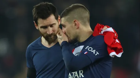 PARIS, FRANCE – FEBRUARY 14: Lionel Messi and Marco Verratti  of Paris Saint-Germain talk after the UEFA Champions League round of 16 leg one match between Paris Saint-Germain and FC Bayern München at Parc des Princes on February 14, 2023 in Paris, France. (Photo by Alex Grimm/Getty Images)
