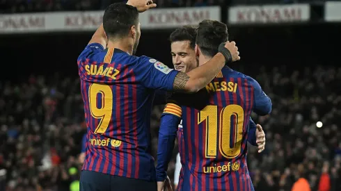 Messi y Suárez, junto a Philippe Coutinho en Barcelona en 2019.
