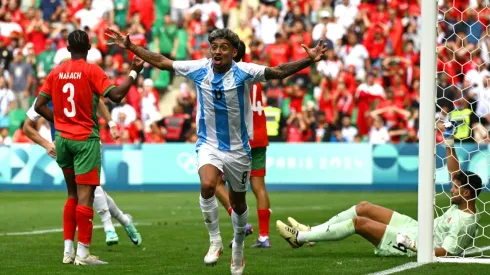 Cristian Medina y el festejo por el gol agónico de Argentina.
