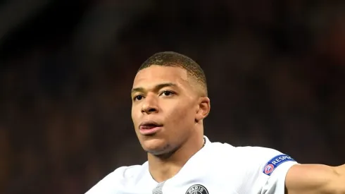 MANCHESTER, ENGLAND – FEBRUARY 12:  Kylian Mbappe of PSG celebrates after scoring his sides second goal during the UEFA Champions League Round of 16 First Leg match between Manchester United and Paris Saint-Germain at Old Trafford on February 12, 2019 in Manchester, England. (Photo by Michael Regan/Getty Images)
