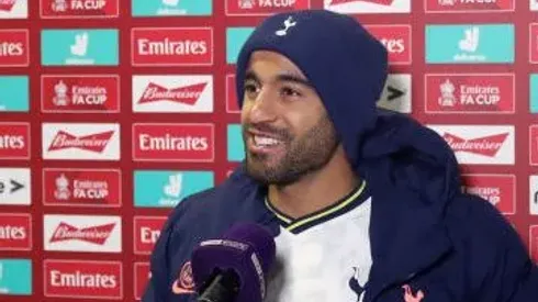 CROSBY, ENGLAND – JANUARY 10: Lucas Moura of Tottenham Hotspur speaks to the media as he is interviewed pitch side after the FA Cup Third Round match between Marine and Tottenham Hotspur at Rossett Park on January 10, 2021 in Crosby, England. Sporting stadiums around England remain under strict restrictions due to the Coronavirus Pandemic as Government social distancing laws prohibit fans inside venues resulting in games being played behind closed doors. (Photo by Clive Brunskill/Getty Images)
