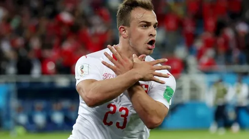 KALININGRAD, RUSSIA – JUNE 22:  Xherdan Shaqiri of Switzerland celebrates after scoring his team's second goal during the 2018 FIFA World Cup Russia group E match between Serbia and Switzerland at Kaliningrad Stadium on June 22, 2018 in Kaliningrad, Russia.  (Photo by Clive Rose/Getty Images)
