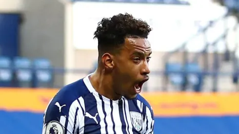 WEST BROMWICH, ENGLAND – APRIL 12: Matheus Pereira of West Bromwich Albion (L) celebrates after scoring their sides first goal with team mate Ainsley Maitland-Niles during the Premier League match between West Bromwich Albion and Southampton at The Hawthorns on April 12, 2021 in West Bromwich, England. Sporting stadiums around the UK remain under strict restrictions due to the Coronavirus Pandemic as Government social distancing laws prohibit fans inside venues resulting in games being played behind closed doors.  (Photo by Michael Steele/Getty Images)
