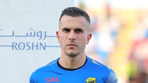 HAIL, SAUDI ARABIA - AUGUST 14: Romarinho and Marcelo Grohe of Al-Ittihad look on as they line up prior to the Saudi Pro League match between Al Raed and Al-Ittihad at King Abdullah Bin Abdualziz Sport City on August 14, 2023 in Hail, Saudi Arabia. (Photo by Getty Images/Getty Images)