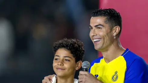 Cristiano Ronaldo accompanied by his partner Georgina Rodriguez and his son Cristiano Ronaldo Jr, greet the crowd during the official unveiling of Cristiano Ronaldo as an Al Nassr player at Mrsool Park Stadium on January 3, 2023 in Riyadh, Saudi Arabia. (Photo by Yasser Bakhsh/Getty Images)
