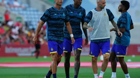 FARO, PORTUGAL – JULY 20: Cristiano Ronaldo of Al Nassr with teammates in action during the warm up before the start of the Pre-Season Friendly match between Al Nassr and SL Benfica at Estadio Algarve on July 20, 2023 in Faro, Portugal.  (Photo by Gualter Fatia/Getty Images)
