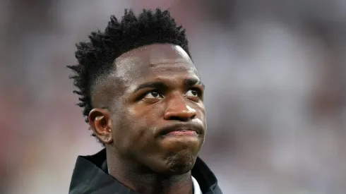 MADRID, SPAIN – MAY 09: Vinicius Junior of Real Madrid lines up on the pitch prior to the UEFA Champions League semi-final first leg match between Real Madrid and Manchester City FC at Estadio Santiago Bernabeu on May 09, 2023 in Madrid, Spain. (Photo by Angel Martinez/Getty Images)
