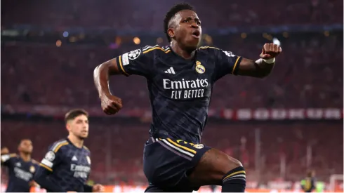 Foto: Alex Pantling/Getty Images - Vini Jr. comemorando gol na Champions