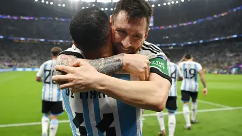 LUSAIL CITY, QATAR - NOVEMBER 26: Lionel Messi (R) of Argentina celebrates scoring their team's first goal with their teammate Angel Di Maria (L) during the FIFA World Cup Qatar 2022 Group C match between Argentina and Mexico at Lusail Stadium on November 26, 2022 in Lusail City, Qatar. (Photo by Dan Mullan/Getty Images)