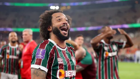 JEDDAH, SAUDI ARABIA – DECEMBER 18: Marcelo of Fluminense celebrates victory with teammates following the FIFA Club World Cup Semi-Final match between Fluminense and Al Ahly FC at King Abdullah Sports City on December 18, 2023 in Jeddah, Saudi Arabia. (Photo by Francois Nel/Getty Images)