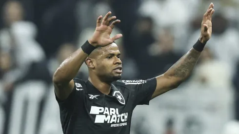 SAO PAULO, BRAZIL – JUNE 01: Junior Santos of Botafogo celebrates after scoring the first goal of his team during a match between Corinthians and Botafogo as part of Brasileirao Series A 2024 at Neo Quimica Arena on June 01, 2024 in Sao Paulo, Brazil.  (Photo by Alexandre Schneider/Getty Images)
