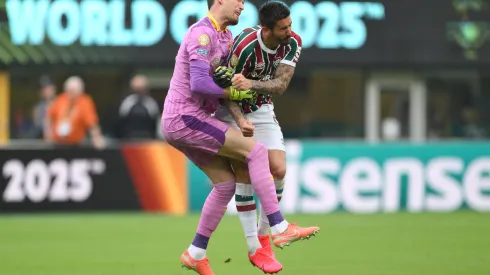 EAST RUTHERFORD, NEW JERSEY – JUNE 17: Gregor Kobel #1 of Borussia Dortmund collides with Everaldo Stum #9 of Fluminense FC during the FIFA Club World Cup 2025 group F match between Fluminense FC and Borussia Dortmund at MetLife Stadium on June 17, 2025 in East Rutherford, New Jersey. (Photo by David Ramos/Getty Images)