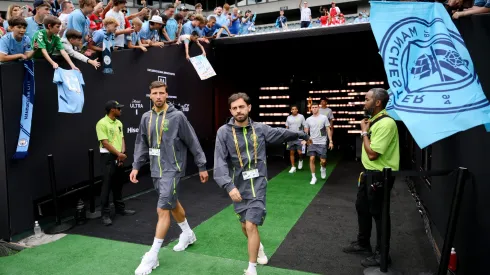 PHILADELPHIA, PENNSYLVANIA – JUNE 18: Ruben Dias #3 and Bernardo Silva #20 of Manchester City walk onto the pitch prior to the FIFA Club World Cup 2025 group G match between Manchester City FC and Wydad AC at Lincoln Financial Field on June 18, 2025 in Philadelphia, Pennsylvania. (Photo by David Ramos/Getty Images)