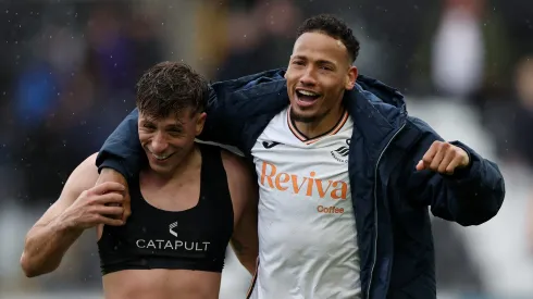 SWANSEA, WALES – APRIL 18: Ronald of Swansea City celebrates victory with teammate Goncalo Franco as they leave the field after Swansea City defeat Hull City during the Sky Bet Championship match between Swansea City AFC and Hull City AFC at Swansea.com Stadium on April 18, 2025 in Swansea, Wales. (Photo by Ryan Hiscott/Getty Images)
