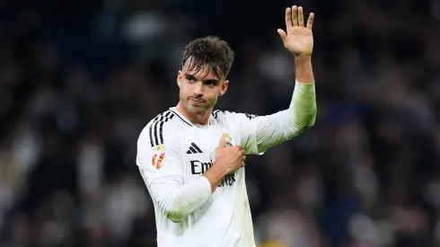 MADRID, SPAIN – FEBRUARY 08: Raul Asencio of Real Madrid acknowledges the fans after the LaLiga match between Real Madrid CF and Atletico de Madrid at Estadio Santiago Bernabeu on February 08, 2025 in Madrid, Spain. (Photo by Angel Martinez/Getty Images)