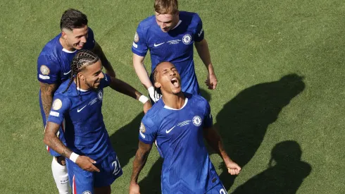 EAST RUTHERFORD, NEW JERSEY – JULY 13: Joao Pedro #20 of Chelsea FC celebrates scoring his team's third goal with Malo Gusto #27, Cole Palmer #10 and Enzo Fernandez #8 of Chelsea FC during the FIFA Club World Cup 2025 Final match between Chelsea FC and Paris Saint-Germain at MetLife Stadium on July 13, 2025 in East Rutherford, New Jersey. (Photo by Michael Reaves/Getty Images)