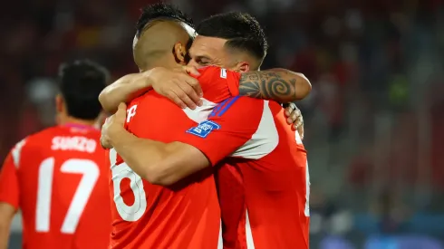 Cepeda y Vidal, en un fuerte abrazo.