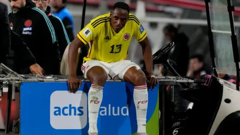 Colombia's Yerry Mina leaves the field during a qualifying soccer match against Chile for the FIFA World Cup 2026 at Monumental stadium in Santiago, Chile, Tuesday, Sept. 12, 2023. (AP Photo/Esteban Felix)
