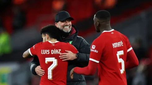 Juergen Klopp, Manager of Liverpool, Luis Diaz and Ibrahima Konate of Liverpool celebrate following the team's victory in the Carabao Cup Semi Final First Leg match between Liverpool and Fulham at Anfield on January 10, 2024 in Liverpool, England. (Photo by Clive Brunskill/Getty Images)
