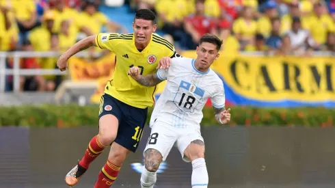 BARRANQUILLA, COLOMBIA – OCTOBER 12: James Rodriguez of Colombia battles for possession with Brian Rodríguez of Uruguay during a FIFA World Cup 2026 Qualifier match between Colombia and Uruguay at Roberto Melendez Metropolitan Stadium on October 12, 2023 in Barranquilla, Colombia. (Photo by Gabriel Aponte/Getty Images)
