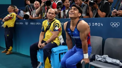 Ángel Barajas junto a su entrenador en la competencia por el oro.
