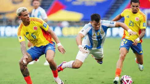 BARRANQUILLA, COLOMBIA – SEPTEMBER 10: Marcos Acuña of Argentina and Richard Rios of Colombia battle for the ball during the South American FIFA World Cup 2026 Qualifier match between Colombia and Argentina at Roberto Melendez Metropolitan Stadium on September 10, 2024 in Barranquilla, Colombia. (Photo by Andres Rot/Getty Images)
