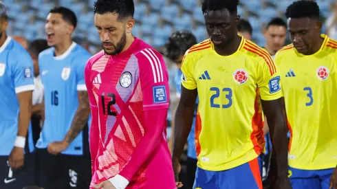 Camilo Vargas and Davinson Sanchez of Colombia enter the pitch prior to the South American Qualifier match between Uruguay and Colombia at Centenario Stadium on November 15, 2024 in Montevideo, Uruguay.  (Photo by Ernesto Ryan/Getty Images)
