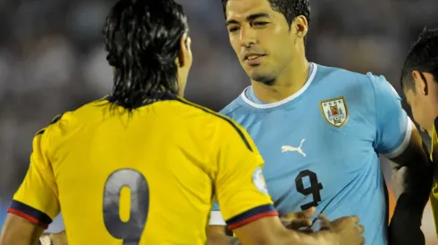 MONTEVIDEO, URUGUAY – SEPTEMBER 10:  Radamel Falcao of Colombia and Luis Su�rez of Uruguay during a match between Uruguay and Colombia as part of the 16th round of the South American Qualifiers at the Centenary Stadium on September 10, 2013 in Montevideo, Uruguay. (Photo by Santiago Mazzarovich/LatinContent/Getty Images)-Not Released (NR)
