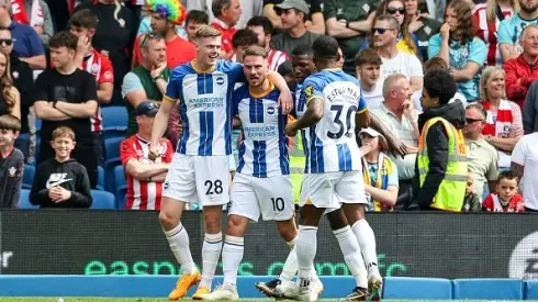 BRIGHTON, ENGLAND – MAY 21: Evan Ferguson of Brighton & Hove Albion celebrates with team-mates Alexis Mac Allister and Pervis Josue Tenorio Estupinan after he scores a goal to make it 1-0 during the Premier League match between Brighton & Hove Albion and Southampton FC at American Express Community Stadium on May 21, 2023 in Brighton, England. (Photo by Robin Jones/Getty Images)
